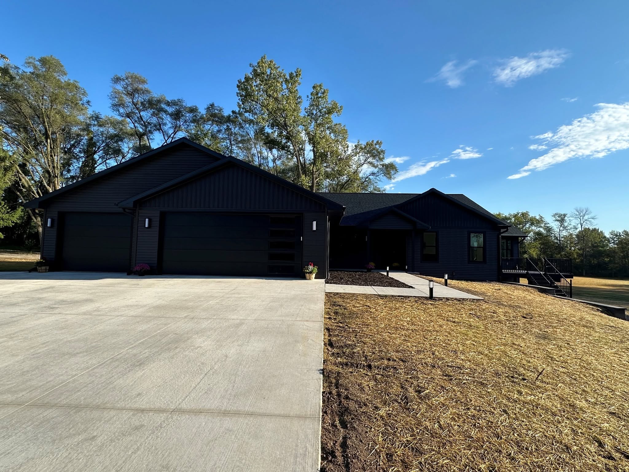 Completed dark exterior custom home