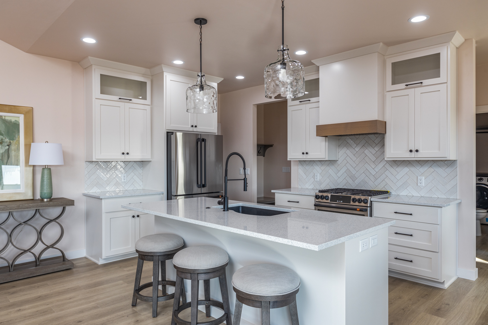 Bright white kitchen with large island